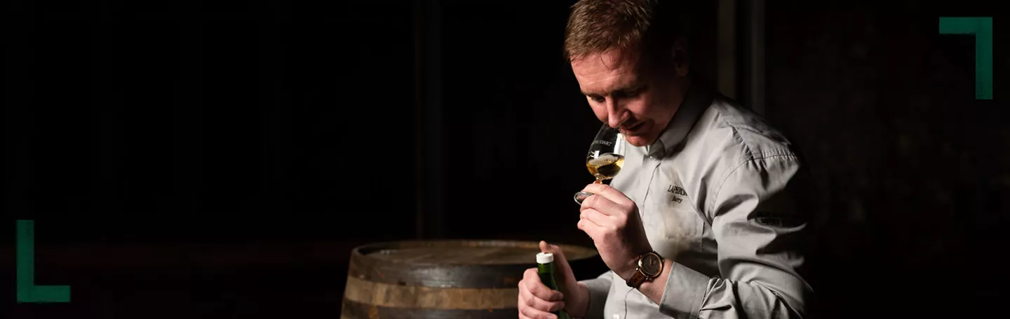 Barry MacAffer nosing a dram of Laphroaig