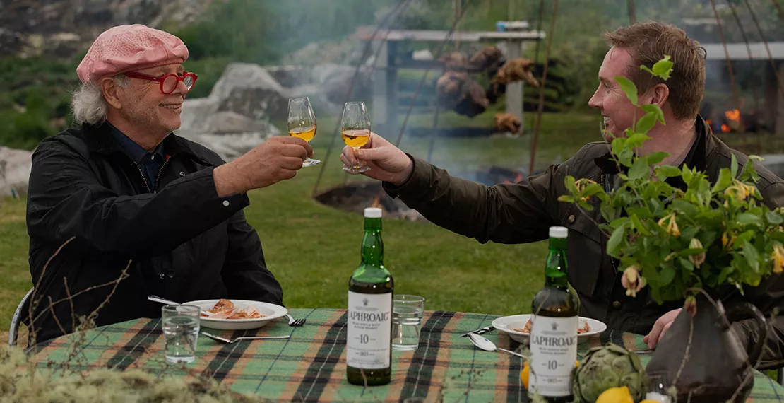 Francis Mallmann and Barry Macaffer toasting